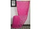 Bright and Delicate Chikankari Work On a Rani Pink Georgette Saree