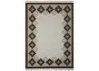 Manufacturer and exporter of designer Custom Made Rugs, Poufs Manufacturers and Exporters in India