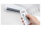 What is the proper evacuation procedure for a new AC installation using a micron gauge?